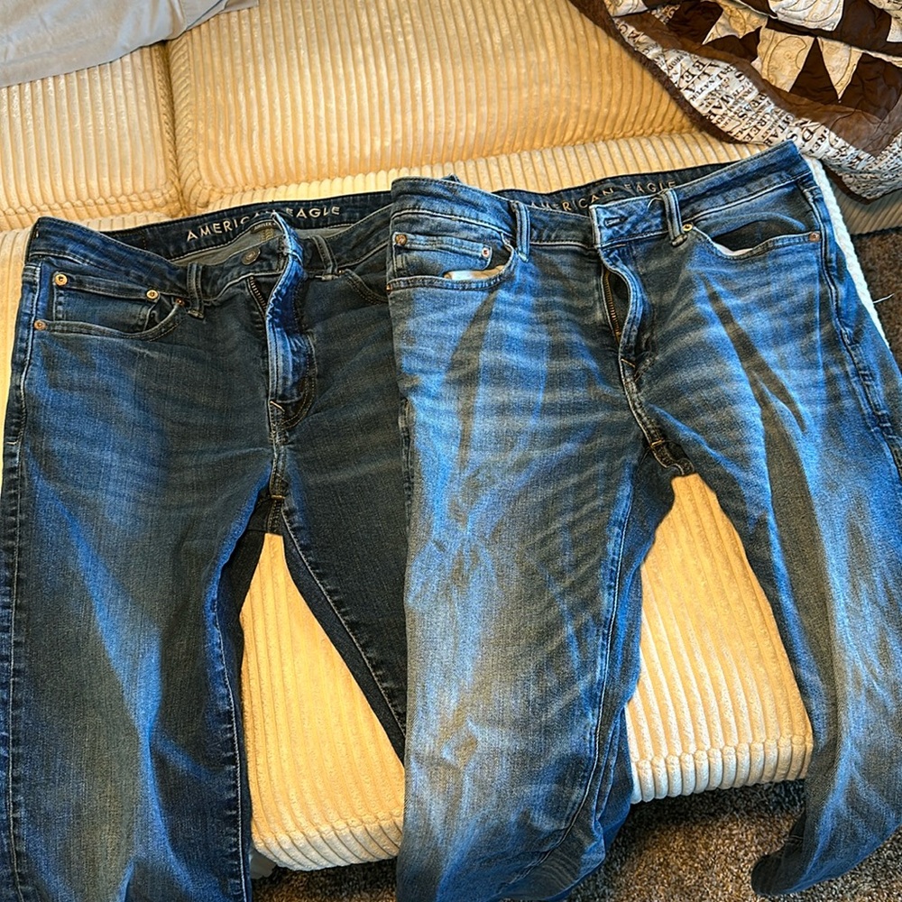 Two pairs of American Eagle men’s air flex jeans